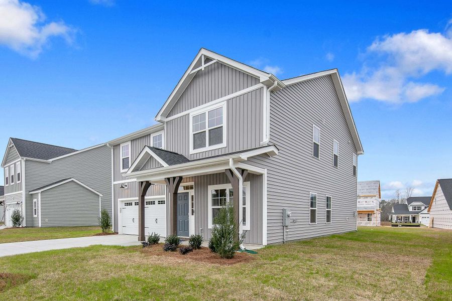 Representative exterior photo of a completed home built from the Magnolia by Caviness & Cates Communities in Bartlett Manor, Youngsville, NC (Image 110).
