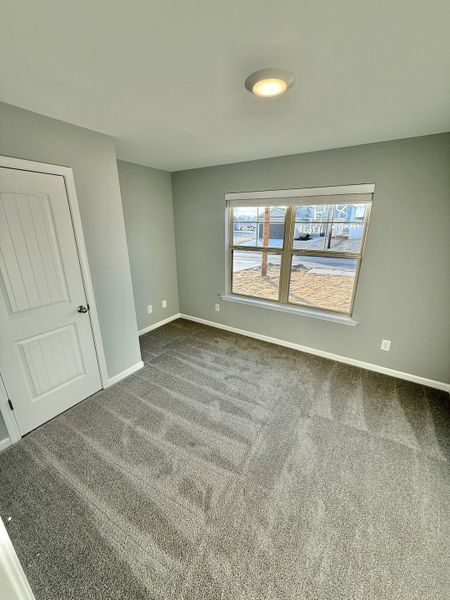 Spacious, unfurnished interior of a new home in Stonehenge, Manchester (Image 9).