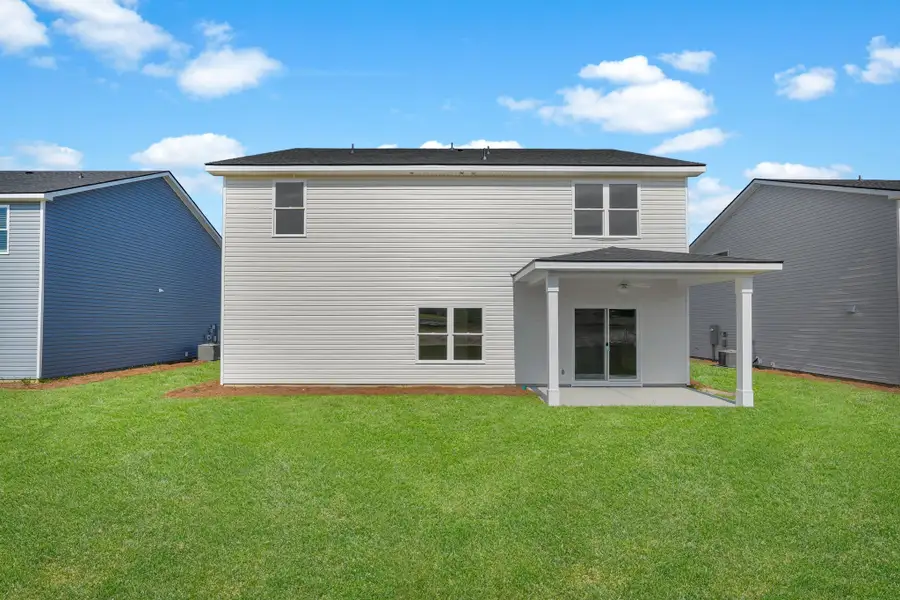 Representative exterior photo of a completed home built from the The Magnolia by Smith Family Homes in Sweetwater, Brunswick, GA (Image 2).