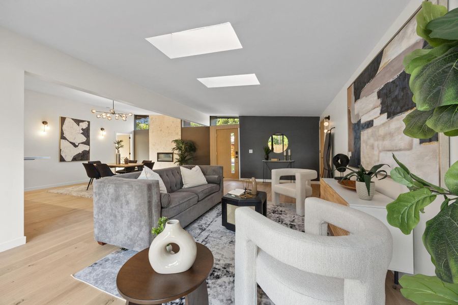 An open-concept layout connects the living and dining areas An open-concept layout connects the living and dining areas