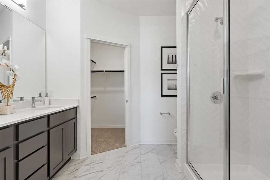 Downstairs primary suite ** Photo of Model Home, not actual Home** Downstairs primary suite ** Photo of Model Home, not actual Home**