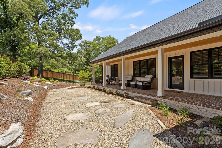 Exterior details and patio area of a home in , Hendersonville (Image 24).
