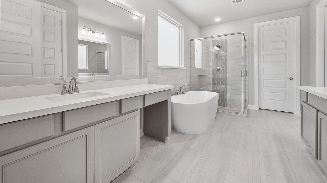 Furnished interior view inside a new home in Sunterra, Katy (Image 15).