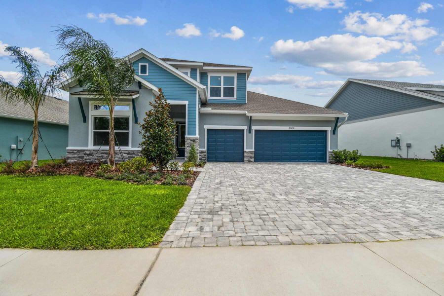 Representative exterior photo of a completed home built from the The Sagan by David Weekley Homes in Chapel Crossings – Classic Series, Wesley Chapel, FL (Image 1). Representative exterior photo of a completed home built from the The Sagan by David Weekley Homes in Chapel Crossings – Classic Series, Wesley Chapel, FL (Image 1).
