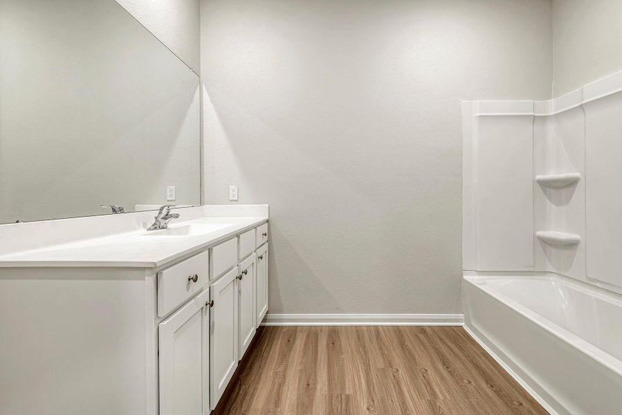 Primary Bathroom comes with a shower and tub combo Primary Bathroom comes with a shower and tub combo