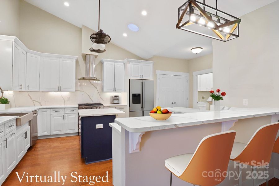 Large kitchen with island, plentiful storage, and ideal layout for hosting Large kitchen with island, plentiful storage, and ideal layout for hosting