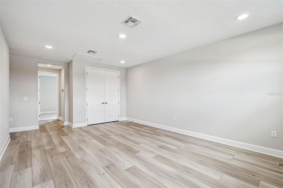 Spacious, unfurnished interior of a new home in Solace at Corner Lake, Orlando (Image 54).