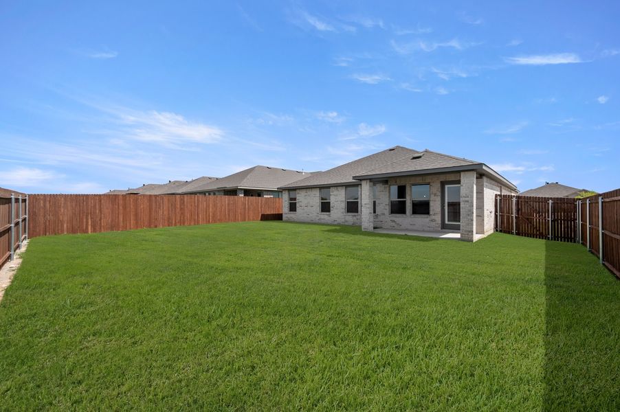 Front exterior of a new home in Baker Farms, Cleburne, TX, highlighting curb appeal (Image 25).