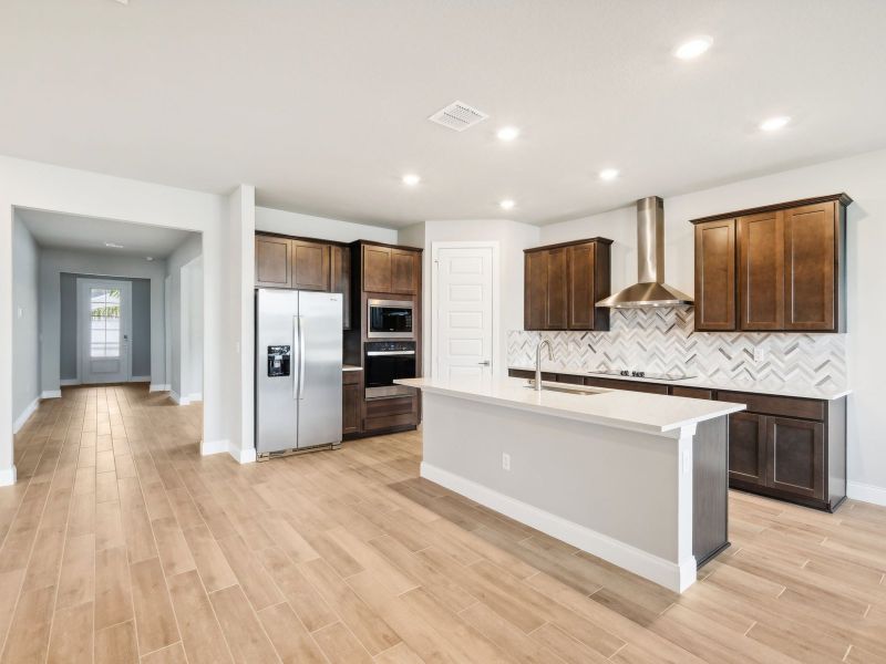 Kitchen in the Jade floorplan at 6358 Sweetwood Drive