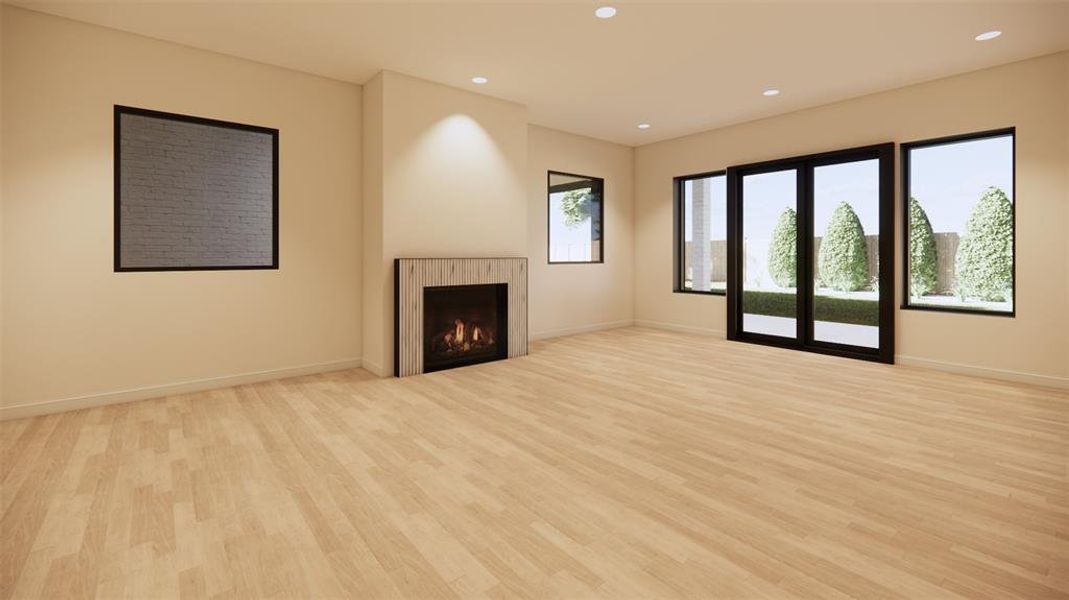 Primary bedroom with view of the private patio and fireplace.