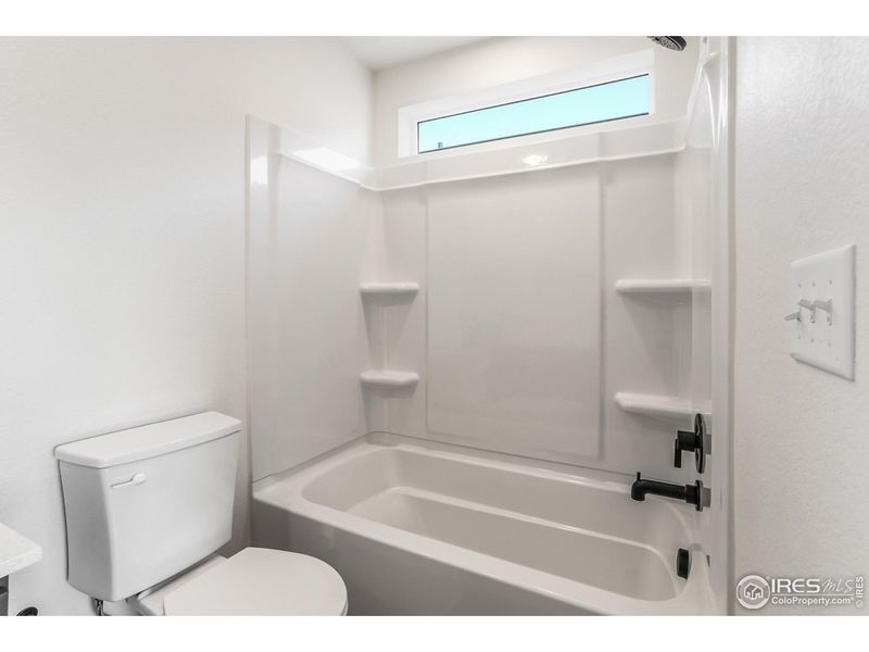 Furnished interior view inside a new home in Bloom Trailblazer Collection - Single Family Homes, Fort Collins (Image 6).