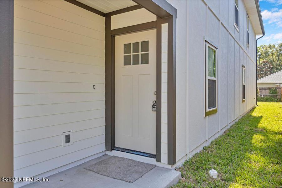 Front exterior of a new home in , Jacksonville, FL, highlighting curb appeal (Image 19).