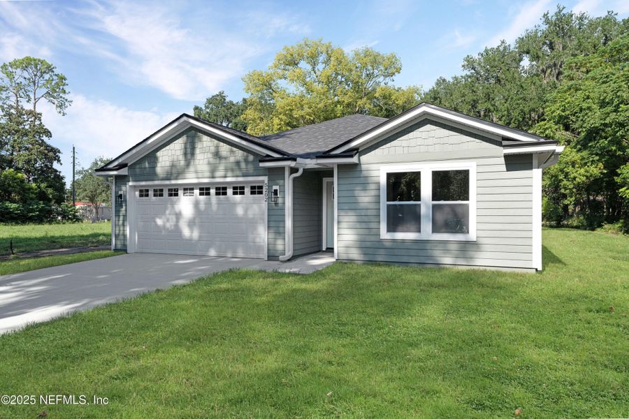 Front exterior of a new home in , Jacksonville, FL, highlighting curb appeal (Image 16).