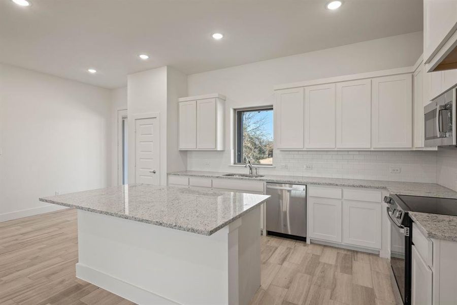 Furnished interior view inside a new home in Saddleback Estates, Boyd (Image 8).