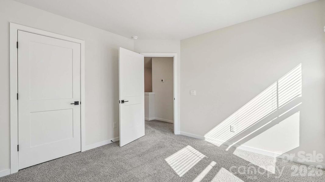 Spacious, unfurnished interior of a new home in The Townes at Lake Norman, Mooresville (Image 24).