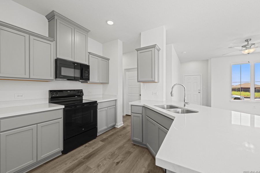Furnished interior view inside a new home in Arroyo Ranch, Seguin (Image 6).