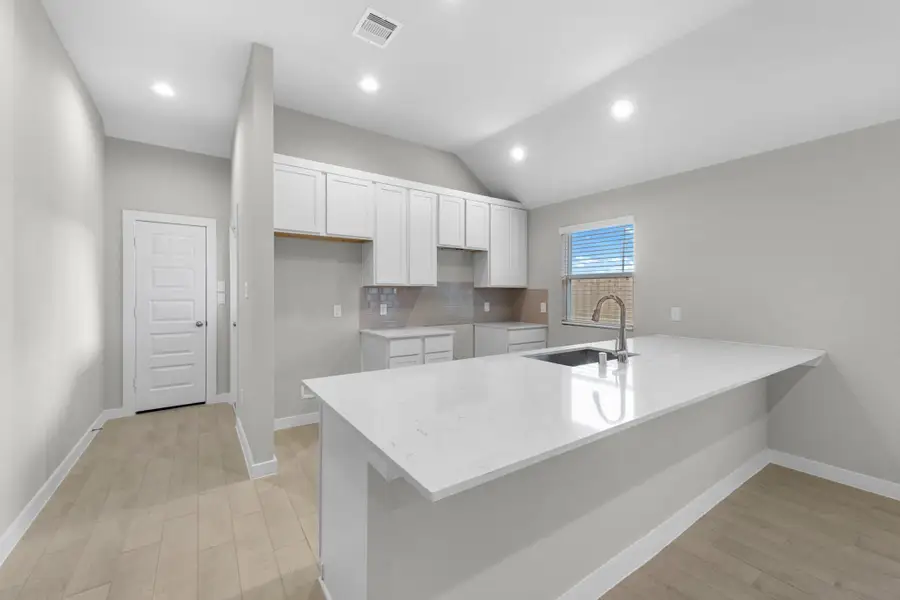 Furnished interior view inside a new home in Grand Oaks Village, Houston (Image 5).