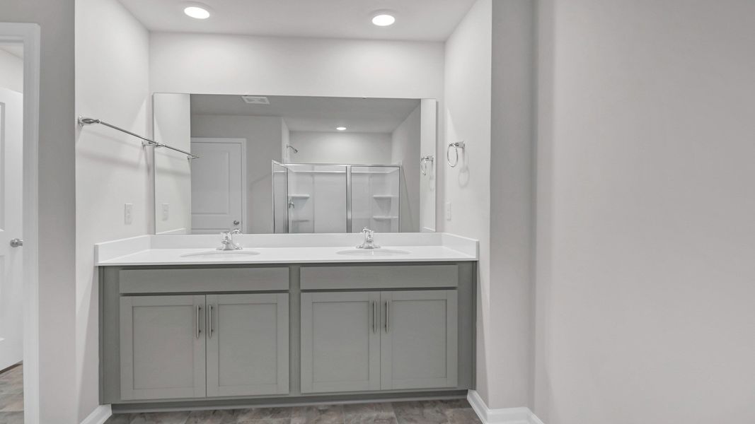 Representative furnished interior of a home built from the ROBIE by D.R. Horton in Ferry Grove, Lexington (Image 13).