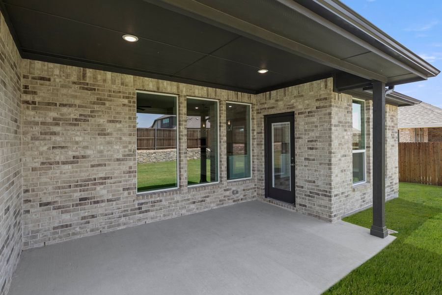 Exterior details and patio area of a home in Lovers Landing, Forney (Image 3). Exterior details and patio area of a home in Lovers Landing, Forney (Image 3).