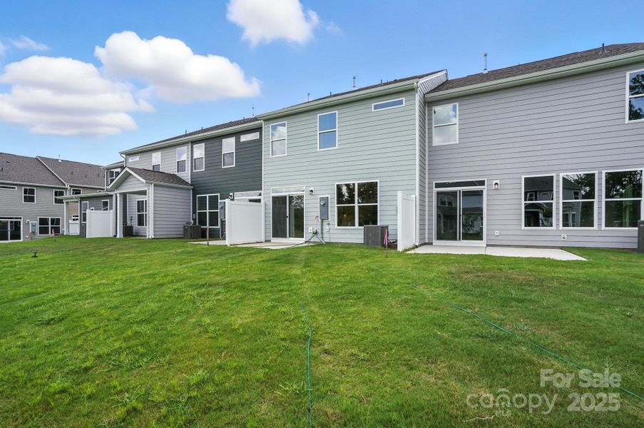 Front exterior of a new home in Harrisburg Village Townhomes, Harrisburg, NC, highlighting curb appeal (Image 15).