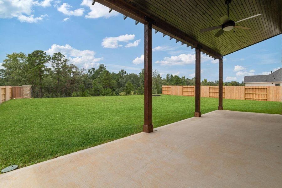 Exterior details and patio area of a home in Magnolia Woods - 70', Magnolia (Image 4).