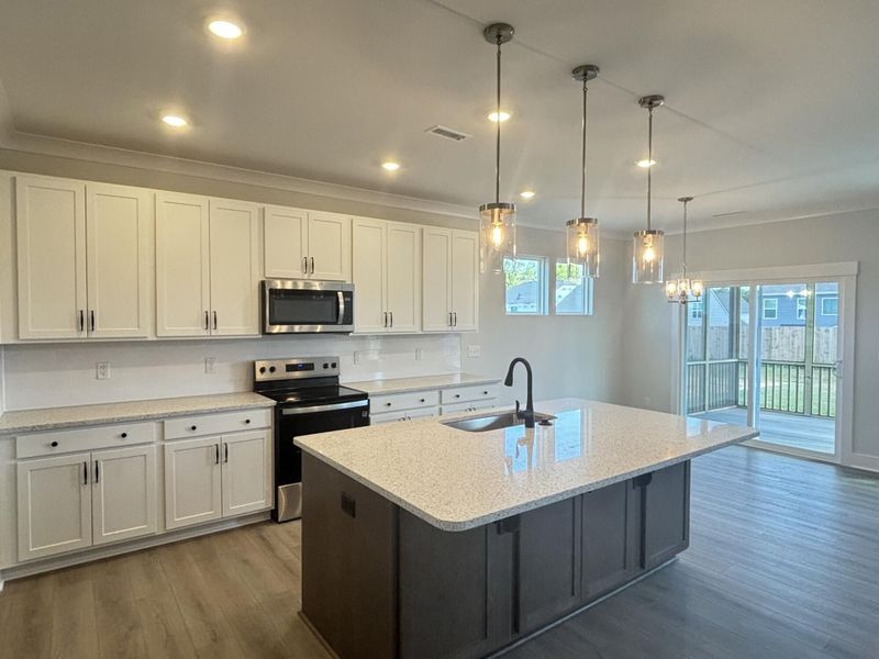 Furnished interior view inside a new home in Daniel Farms, Benson (Image 7).