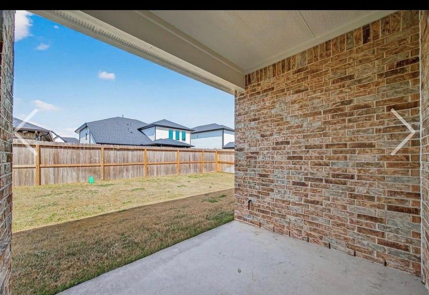 Exterior details and patio area of a home in Harvest Green, Richmond (Image 3).