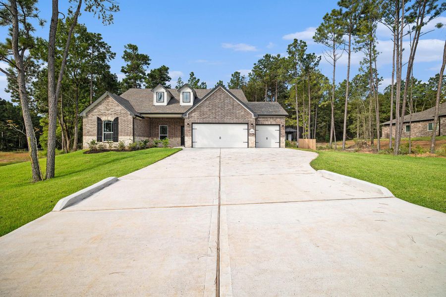 Front exterior of a new home in , Bay City, TX, highlighting curb appeal (Image 16). Front exterior of a new home in , Bay City, TX, highlighting curb appeal (Image 16).