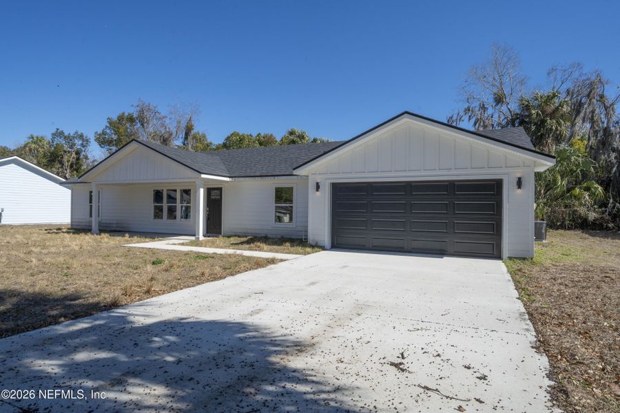 Front exterior of a new home in , Palatka, FL, highlighting curb appeal (Image 19).