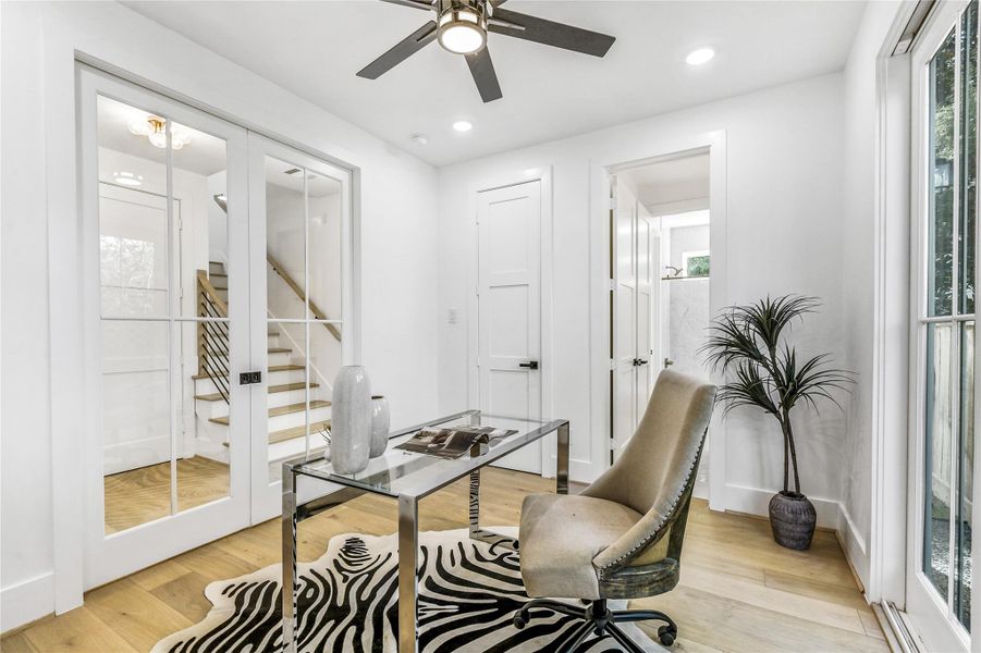 Framed by modern French doors and flooded withnatural light, this dedicated workspace offers quiet separation from the main living areas. The room’s proportions and finishes reflect a commitment to craftsmanship—ideal for physicians, researchers, or graduate professionals seeking a serene environment for productivity or study.