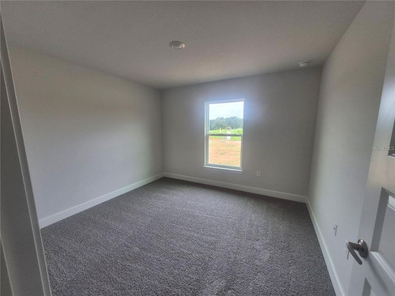 Spacious, unfurnished interior of a new home in Hill Country Estates, Dade City (Image 15).