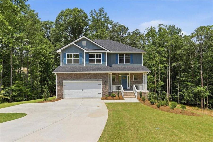 Front exterior of a new home in Tuscany Hills, Douglasville, GA, highlighting curb appeal (Image 1). Front exterior of a new home in Tuscany Hills, Douglasville, GA, highlighting curb appeal (Image 1).