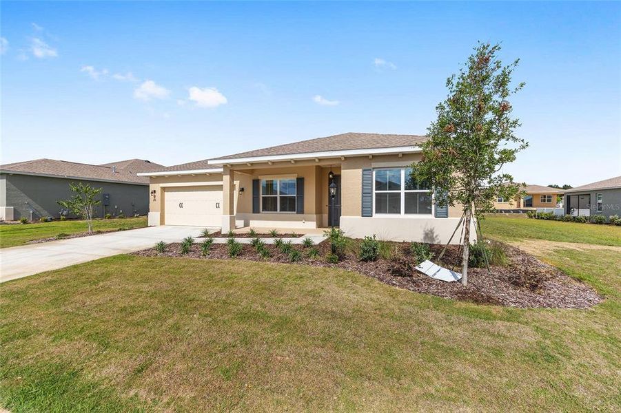 Front exterior of a new home in , Ocala, FL, highlighting curb appeal (Image 19).