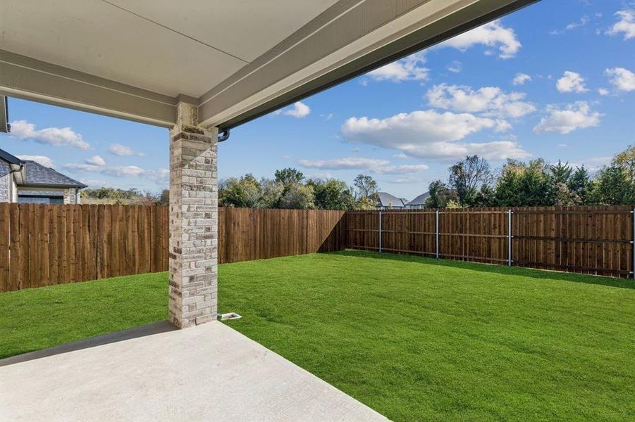 Covered Patio in the Oscar home plan by Trophy Signature Homes – REPRESENTATIVE PHOTO