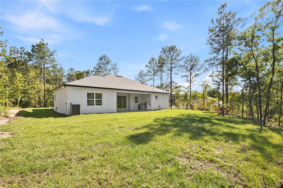 Exterior details and patio area of a home in , Ocala (Image 32).