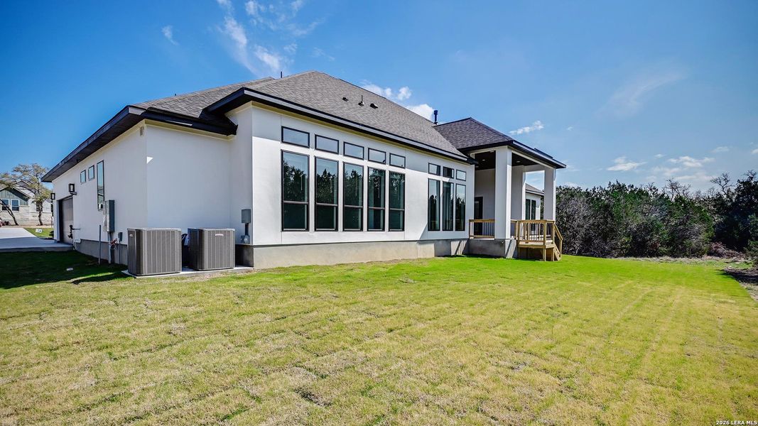 Exterior details and patio area of a home in Thornebrook, Bulverde (Image 22).