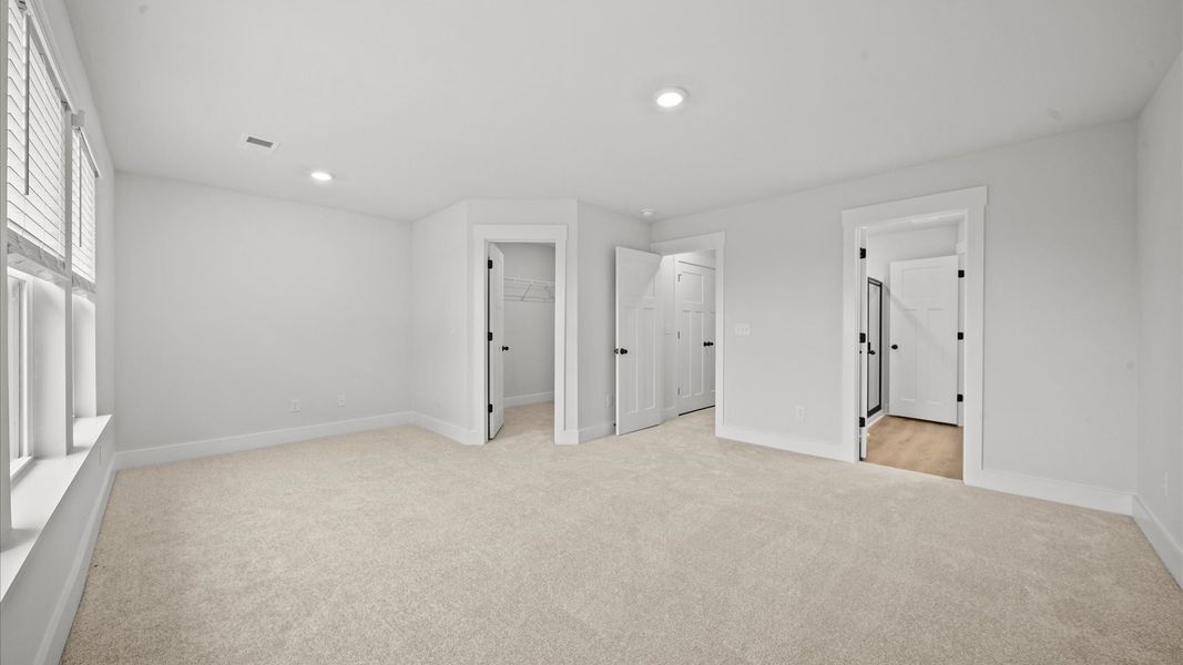 Desirable primary suite layout with spacious en suite bath in a proven, established community