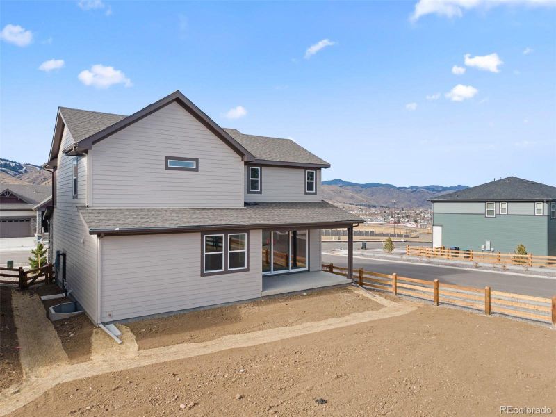 Exterior details and patio area of a home in The Manors Collection at Golden Overlook, Golden (Image 3).