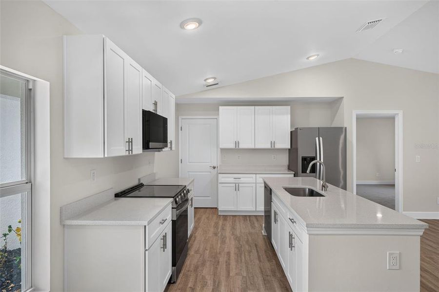 Furnished interior view inside a new home in , Port Charlotte (Image 6).