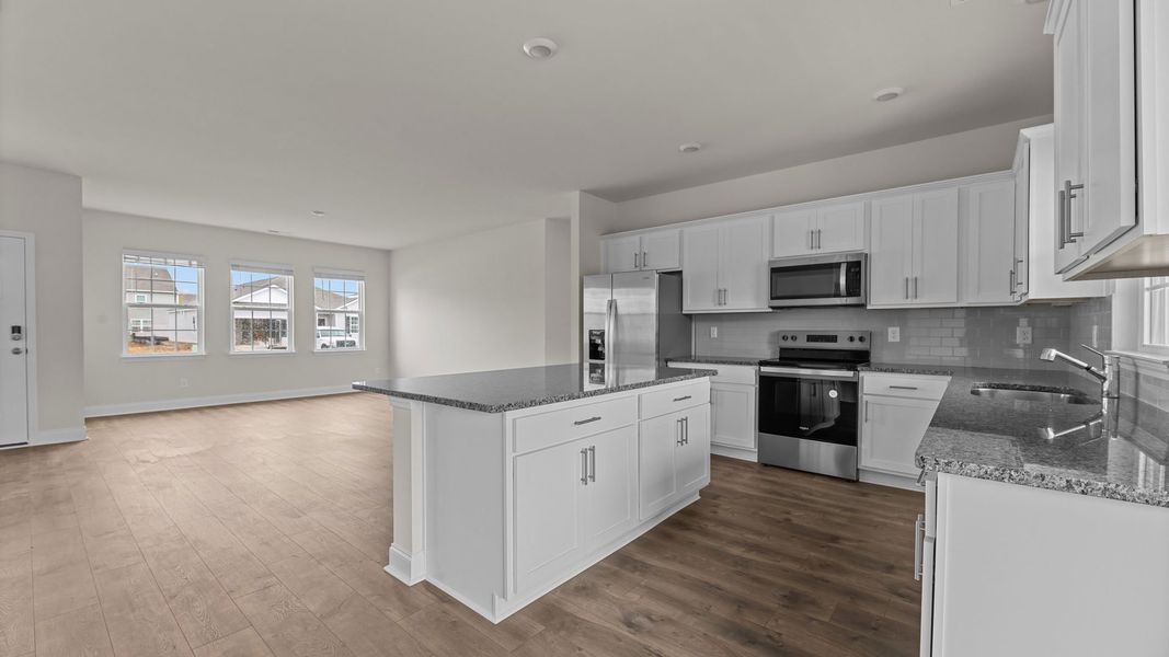 Furnished interior view inside a new home in Tyler - Home on the Lake, New Bern (Image 5). Furnished interior view inside a new home in Tyler - Home on the Lake, New Bern (Image 5).