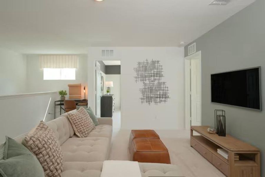 Photo of Pulte model home with same floor plan, not of actual home listed. Photo of Pulte model home with same floor plan, not of actual home listed.