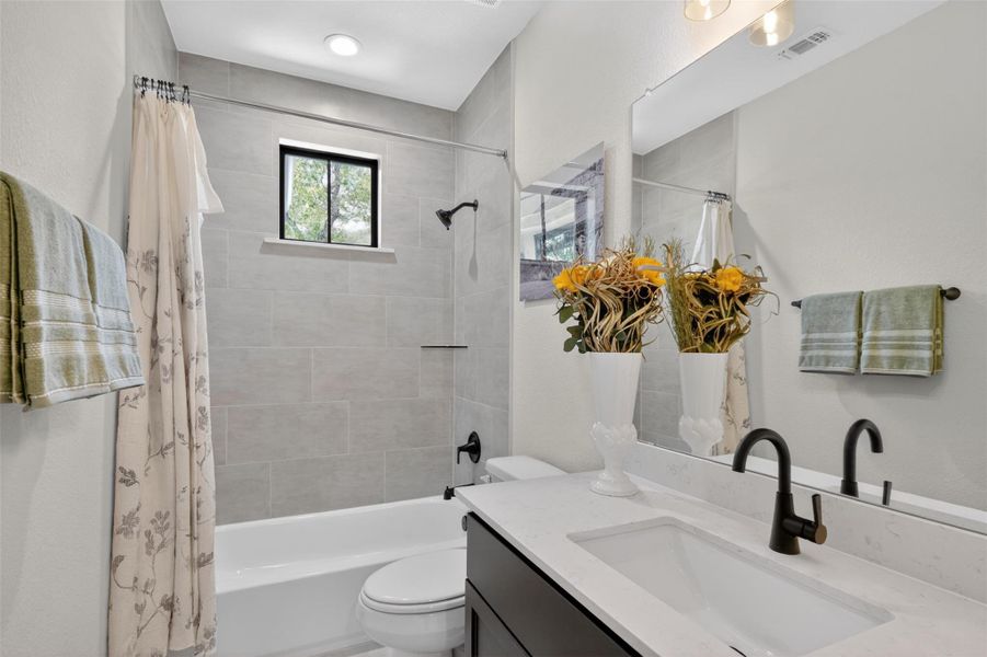 A well-lit bathroom with a clean aesthetic and practical layout for daily routines. A well-lit bathroom with a clean aesthetic and practical layout for daily routines.