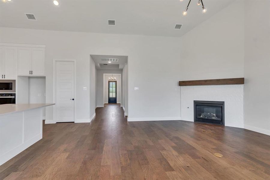 Unfurnished living room with hardwood / wood-style floors