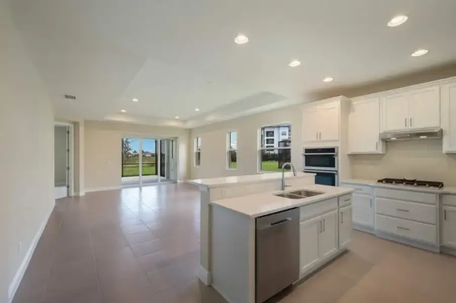 Representative furnished interior of a home built from the Boca Grande by Medallion Home in Reflection Villas at Watercolor Place, Bradenton (Image 5).