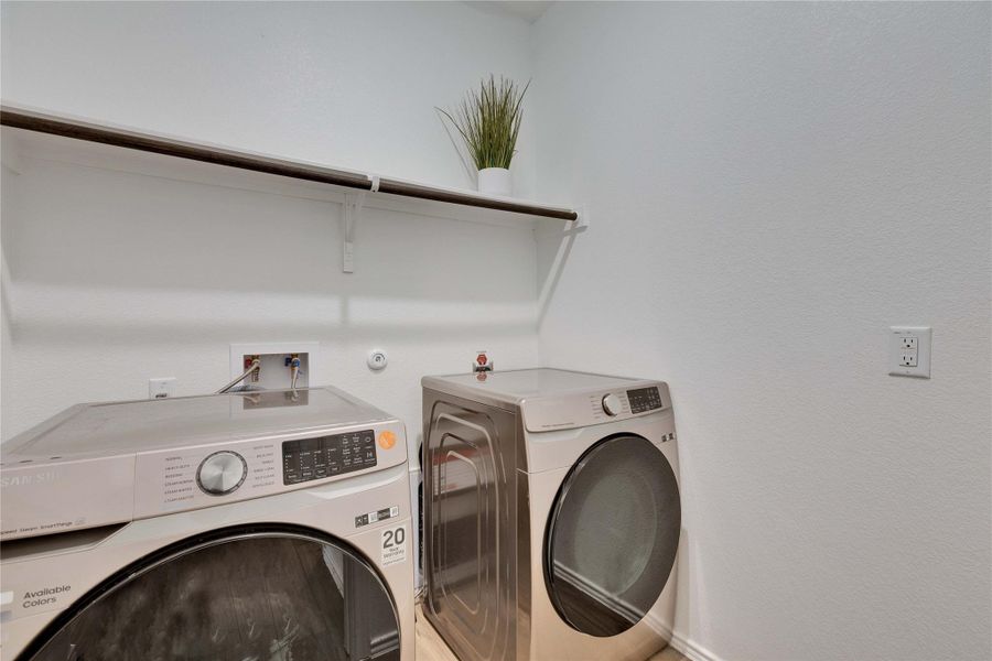Laundry room featuring front loading washing machine and dryer. Laundry room featuring front loading washing machine and dryer.