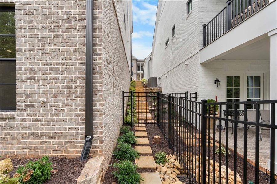 Exterior details and patio area of a home in Waterside Single Family, Peachtree Corners (Image 4). Exterior details and patio area of a home in Waterside Single Family, Peachtree Corners (Image 4).