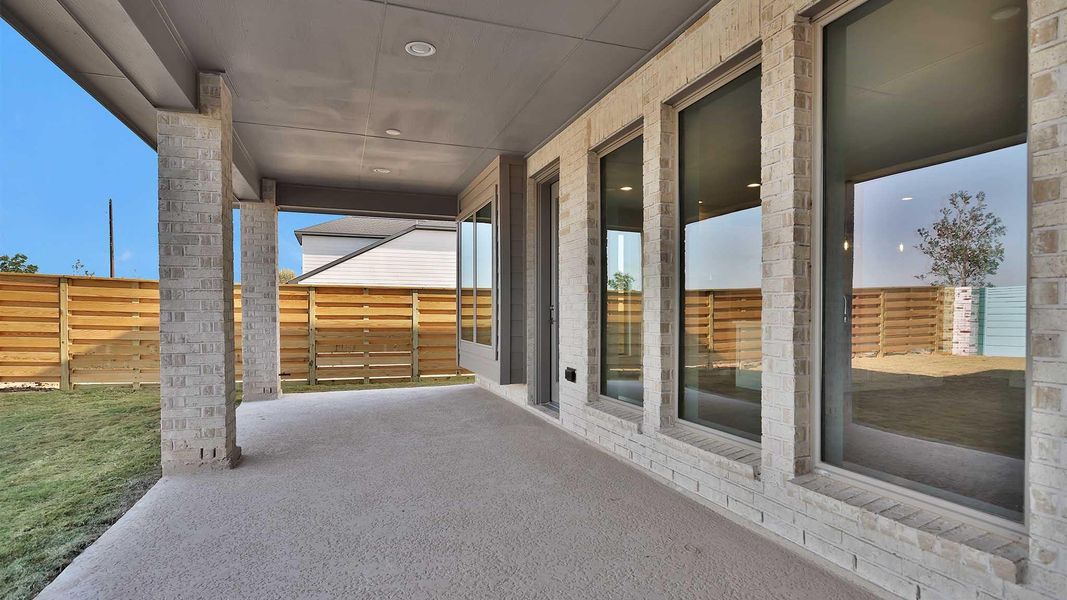 Exterior details and patio area of a home in Austin Point 60', Richmond (Image 2).