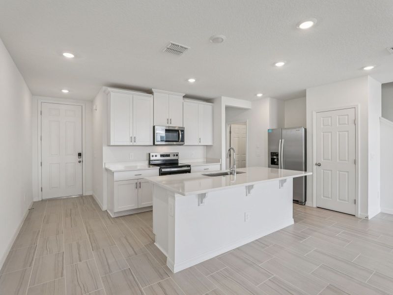 Furnished interior view inside a new home in The Meadow at Crossprairie Townes, St. Cloud (Image 3). Furnished interior view inside a new home in The Meadow at Crossprairie Townes, St. Cloud (Image 3).