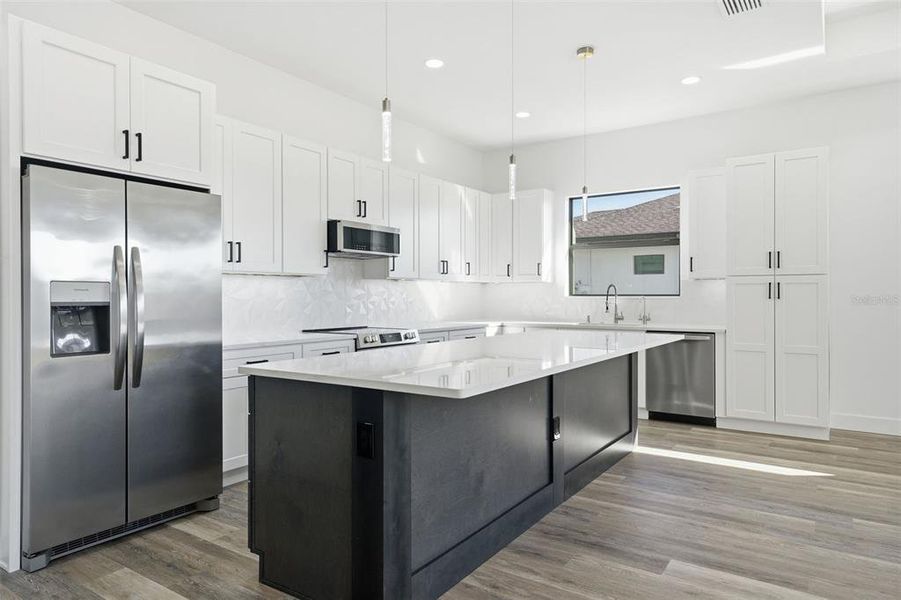 Furnished interior view inside a new home in , Port Charlotte (Image 10).