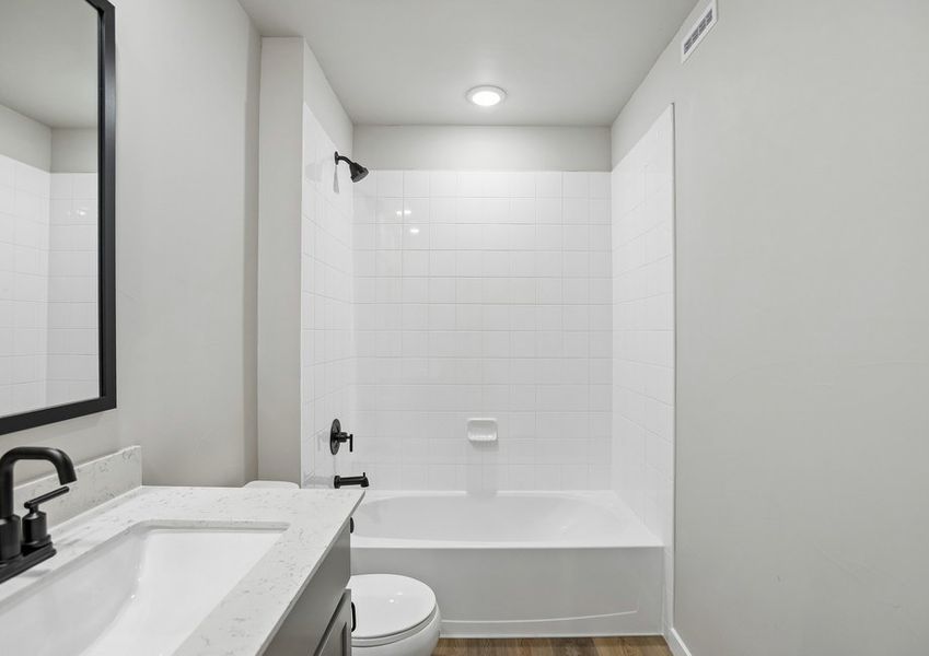 One of the secondary bedrooms have a tub/shower combo.